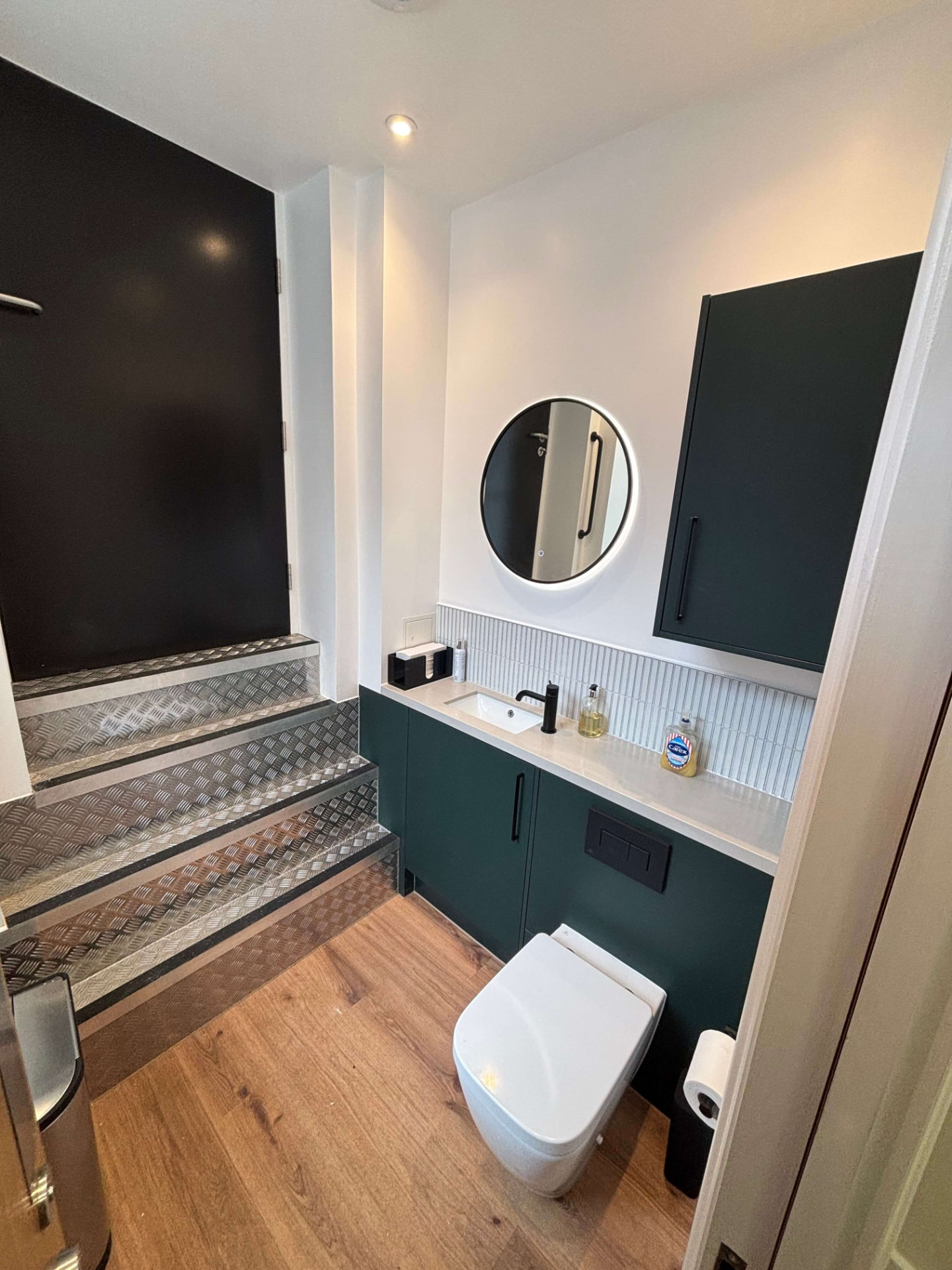 Commercial interior with vertical service pipework
